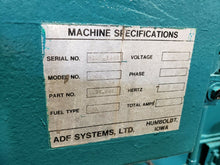 ADF SYSTEMS MODEL 300 STAINLESS FRONT LOADING ROTARY PARTS WASHER 48" DIA CAP.